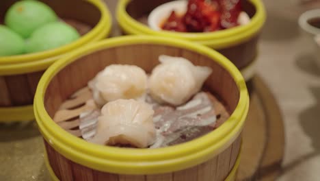 delicious steamed dumplings in a bamboo steamer