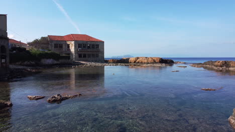 House-by-the-water-with-rocks