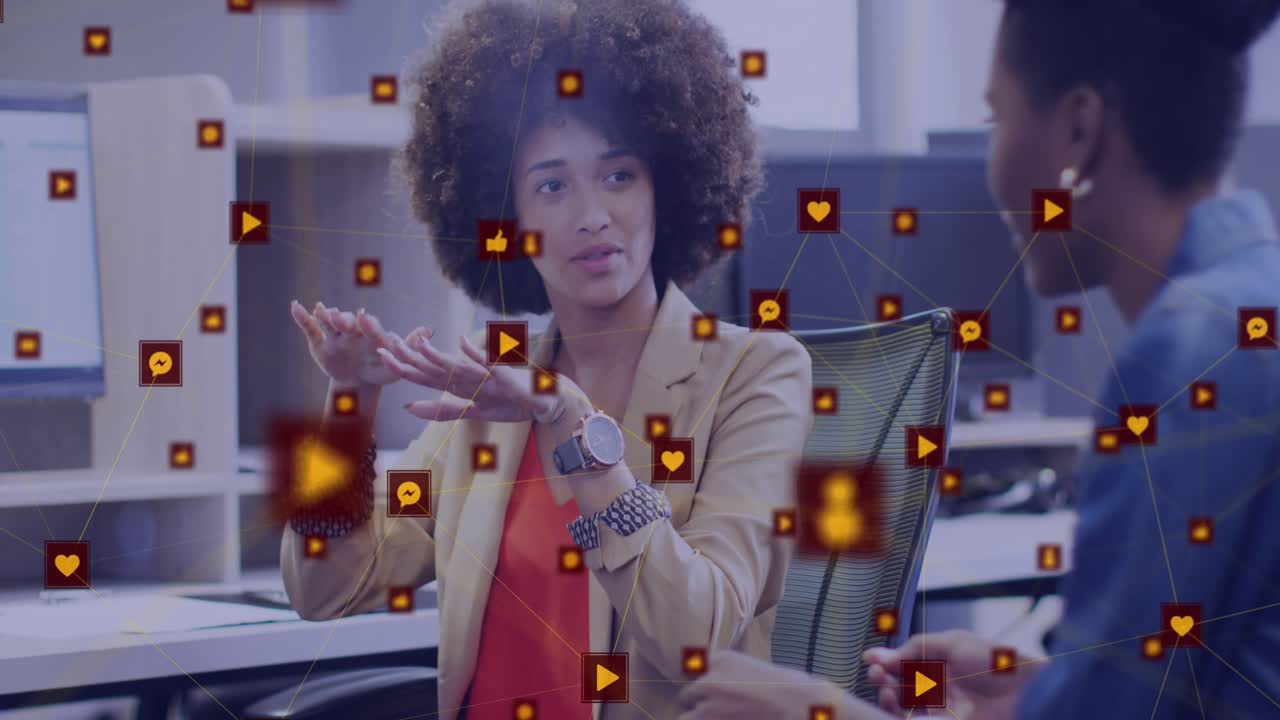 Diverse businesswomen discussing a project in an office setting