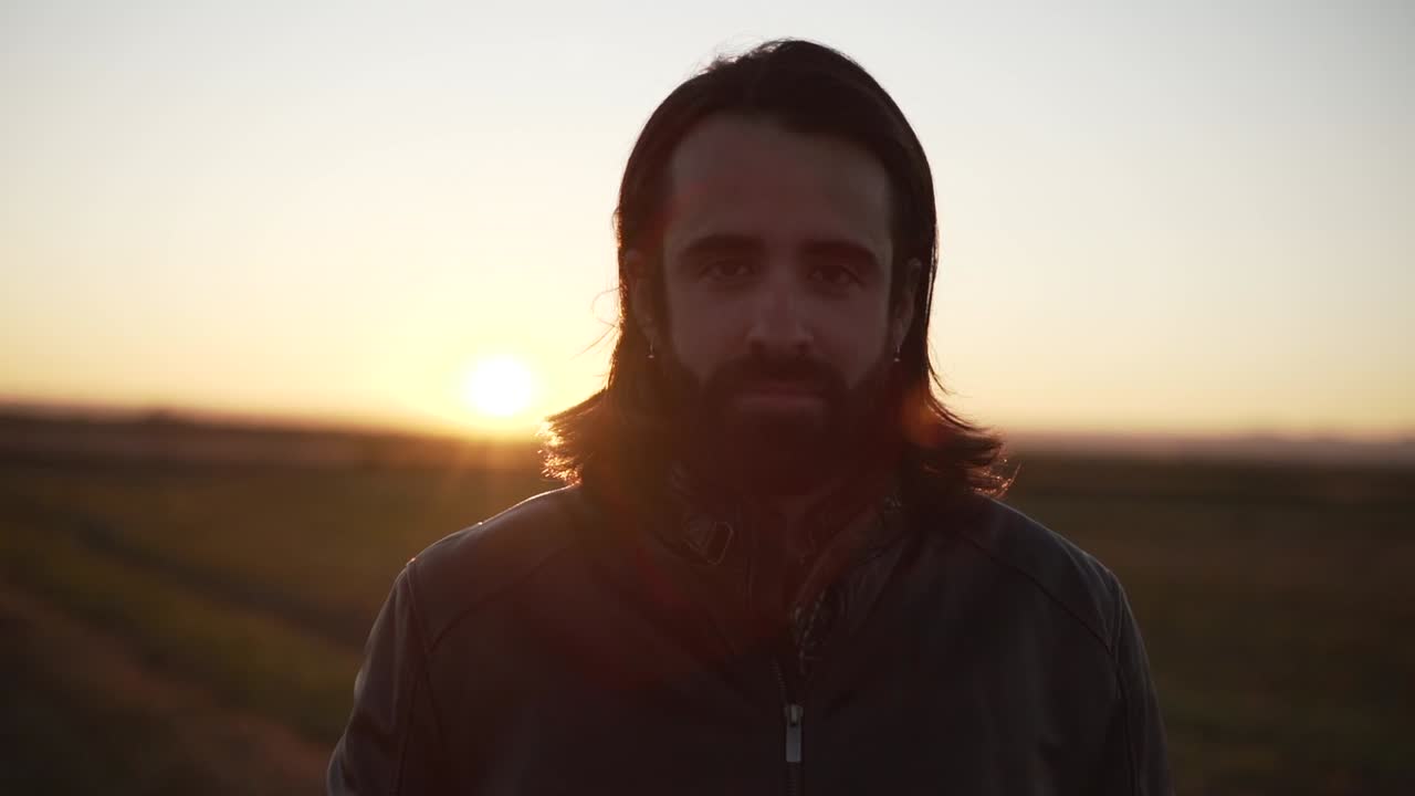 Man at Sunset in a Field