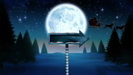 santa in sleigh with reindeer flying and arrow sign over night forest with moon