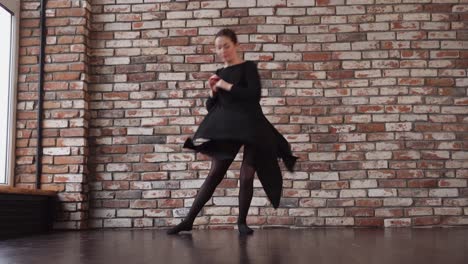 woman dancing in a black dress