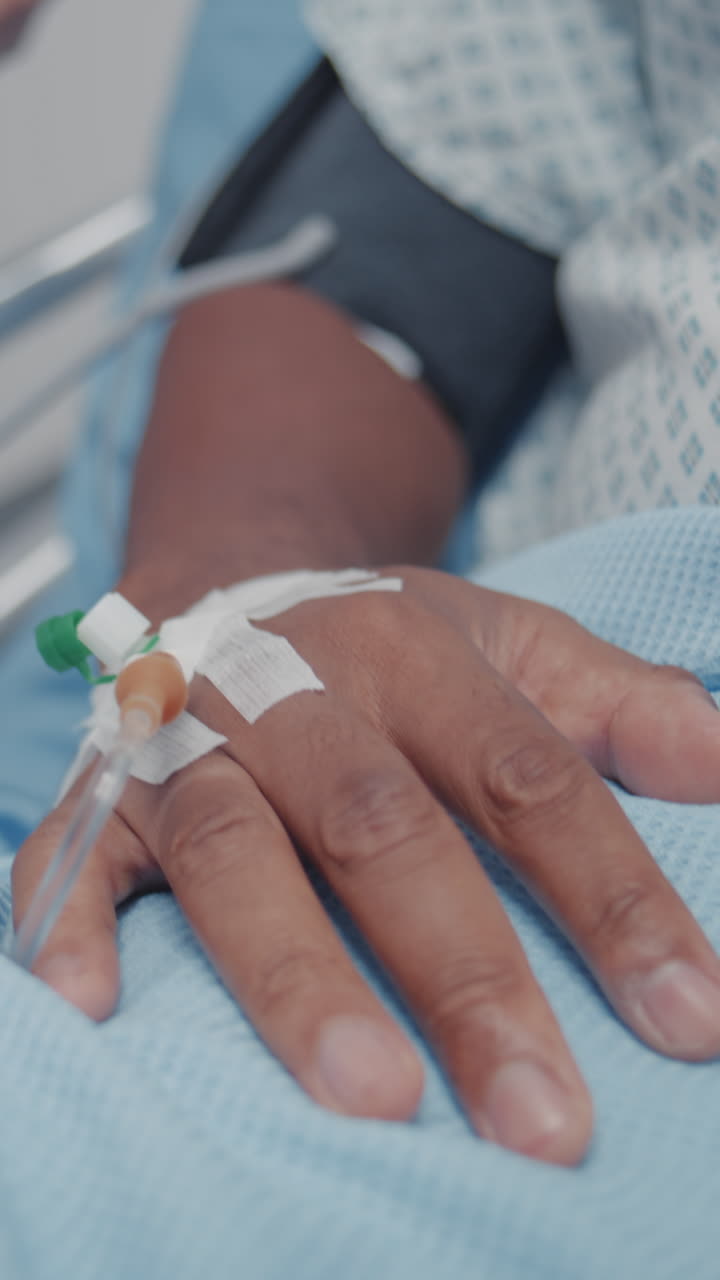 African american patient lies on gurney with venou 4k 2025 08 04 09 20 58 utc.mov | african american, black, blood pressure, care