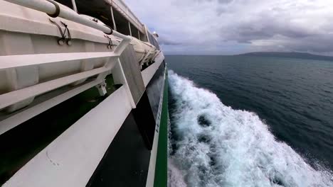 Philippines:-Experience-the-external-view-from-a-passenger-ferry-as-we-travel-between-Bohol-and-Cebu,-feeling-as-if-you're-standing-on-the-deck