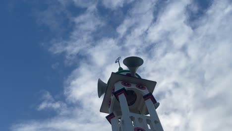 cinematic shot of the minaret mosque playing the azan in syhet