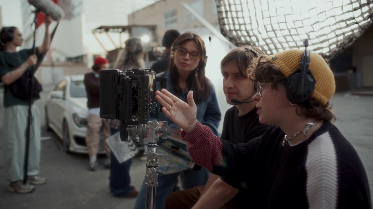 Video Production Crew Discussing Captured Scene on Camera Monitor on Set