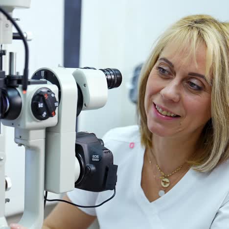 man checking eyesight with christmas cap. doctor check the eyesight of man with christmas cap with modern equipment