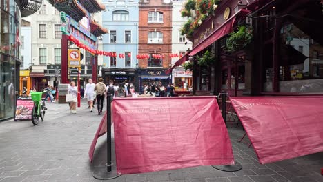 people walking in vibrant chinatown street