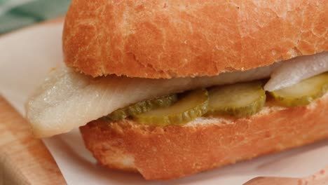herring sandwich with pickles