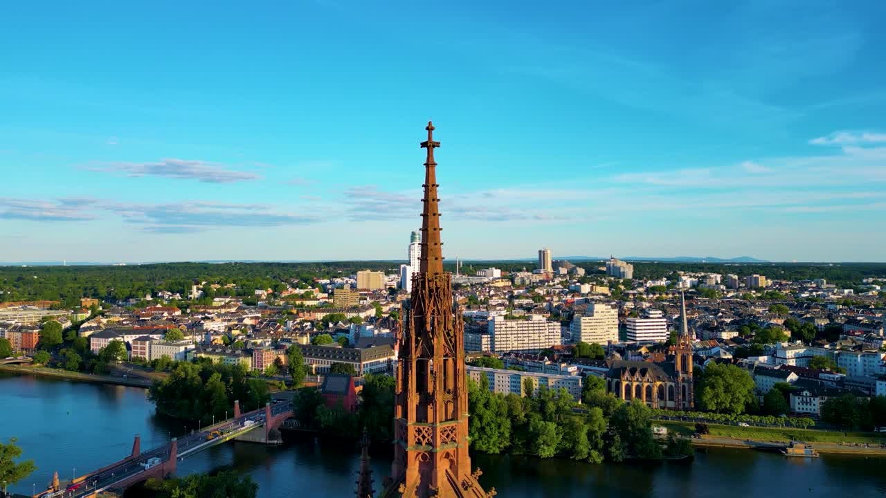 4K Drone Video of the Spire of the Gothic-Style Kaiserdom St. Bartholomäus Cathedral in Downtown Frankfurt, Germany on the Main River