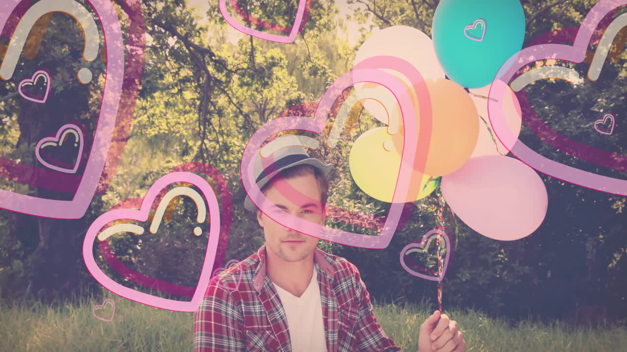 Young man holding colorful balloons with heart and rainbow animations overlay