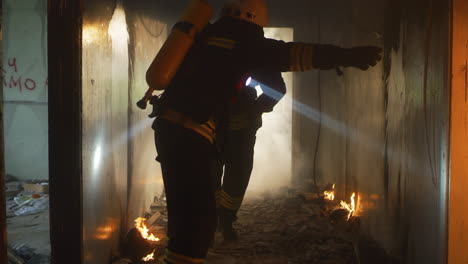 firefighters in action during a building fire