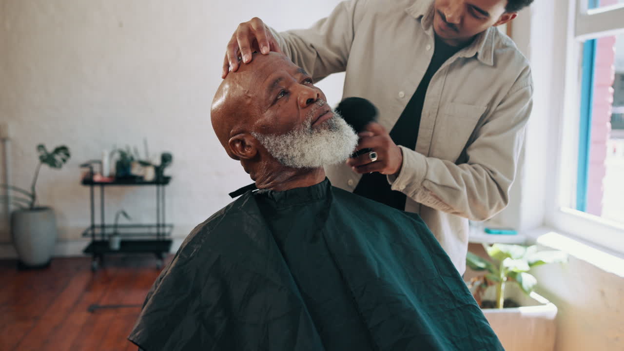 Barber Brushing an Older Man's Beard in a Barbershop