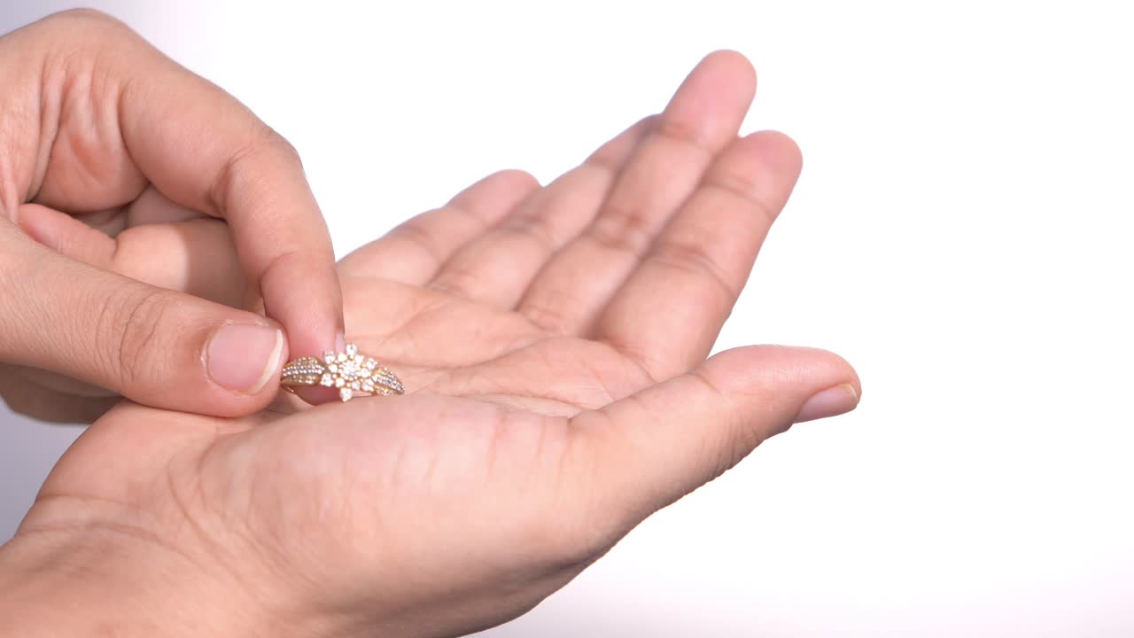 Woman holding a diamond ring