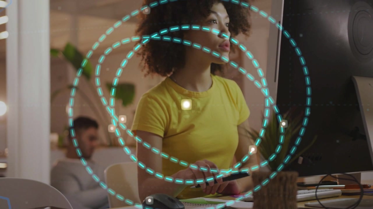 Woman drawing on tablet, stylus activating cyan rings expanding across desk for design feedback