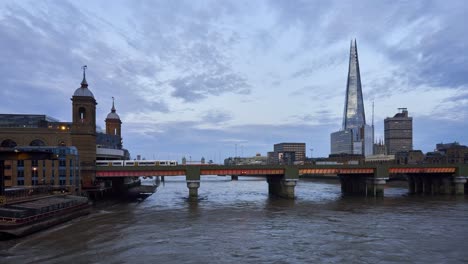 london evening skyline timelapse with the shard skyscraper and cannon street train station