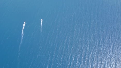 4k drone footage speedboat cruising at the ocean, indonesia