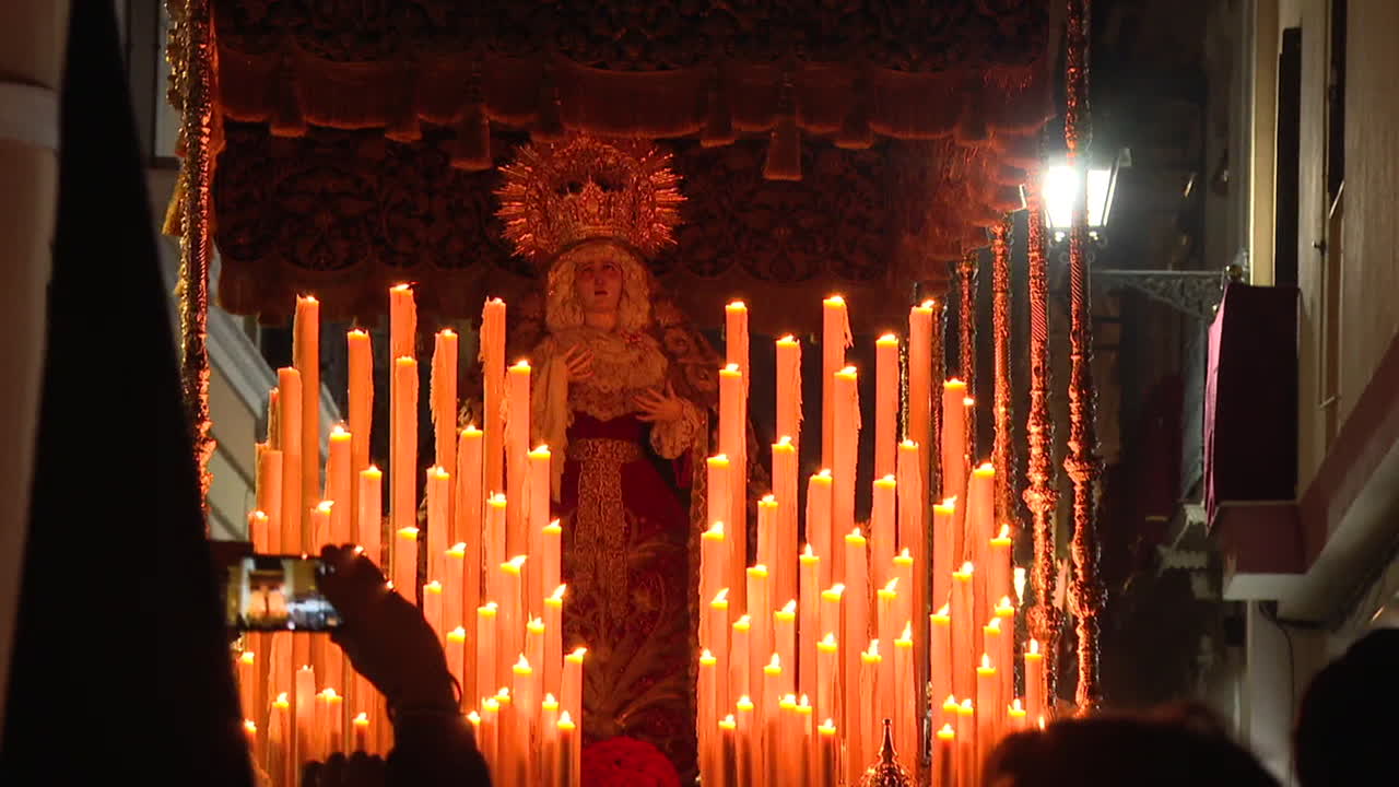 Religious Procession at Night with Candles