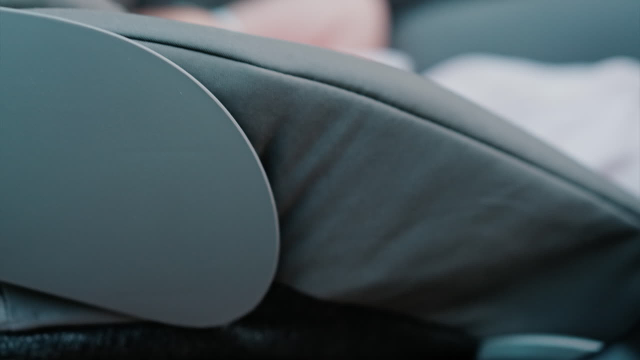 Close up of a mother pushing a stroller with a baby inside