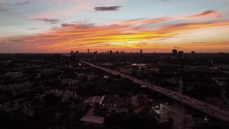 flying over a neighborhood in houston, dusk in texas, usa - rising, aerial view