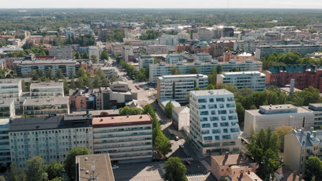 Flying-over-rooftops-of-Nordic-town-Vaasa,-aerial-4k