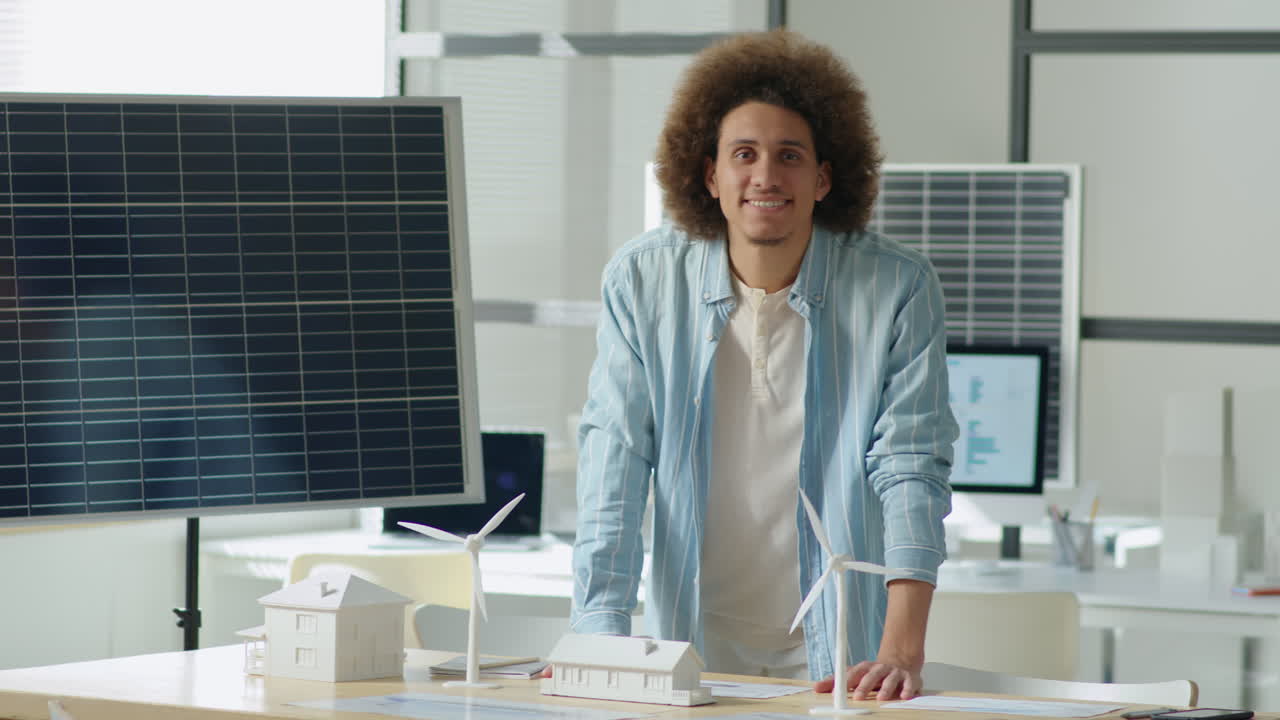 Portrait of Smiling Renewable Energy Developer at Work