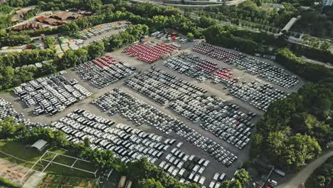 Hundreds-of-brand-new-cars-in-Toyota-car-park,-Tin-Shui-Wai,-Hong-Kong