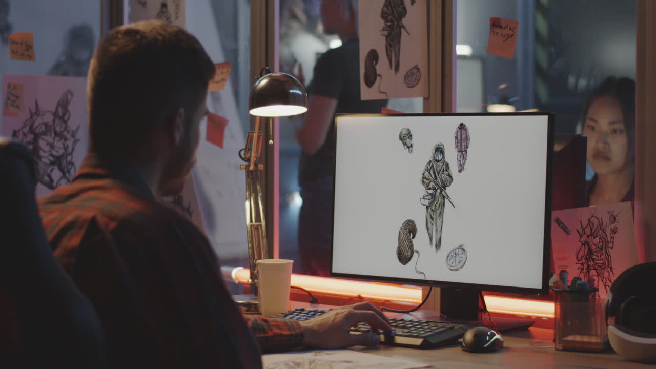 Tattoo artist working on a digital illustration.