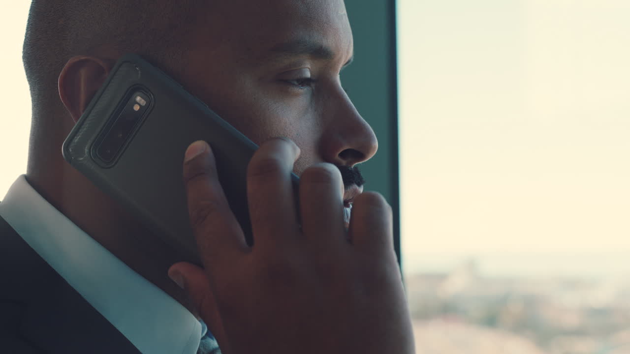 Businessman, face and phone call at window