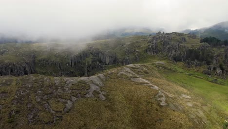 steep rugged mountains with volcanic rock pillars at cumbemayo archaeological site, cajamarca in peru