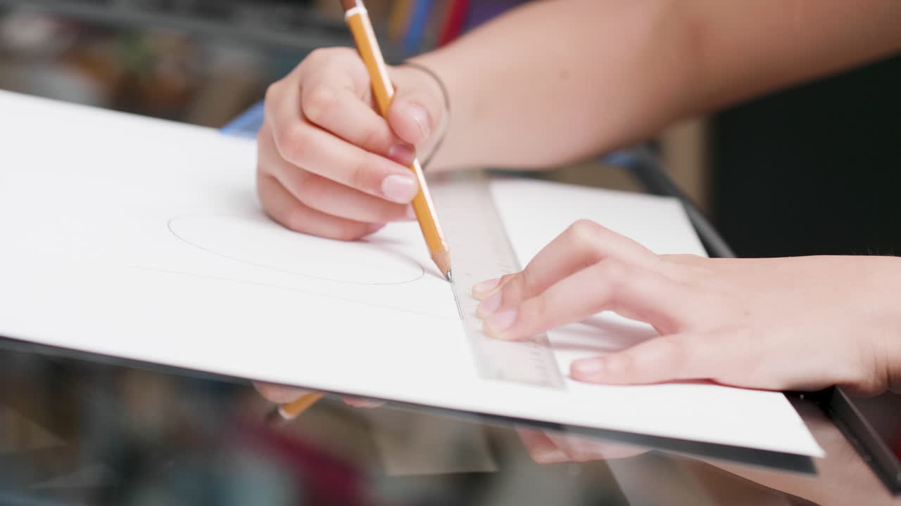 Drawing with a pencil and ruler