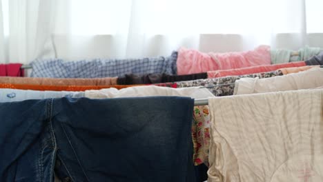 child clothes line filled with hanging trousers