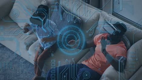 animation of scope scanning and computer circuit board over african american man and his son