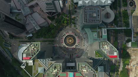 sunny day singapore city famous downtown buildings traffic circle square aerial panorama 4k