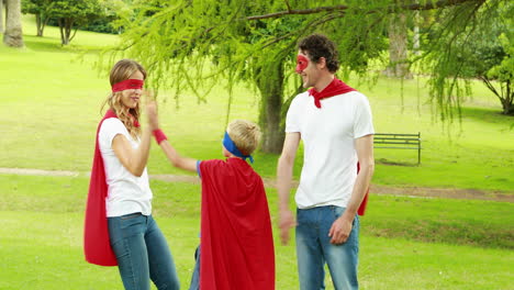 family pretending to be superhero