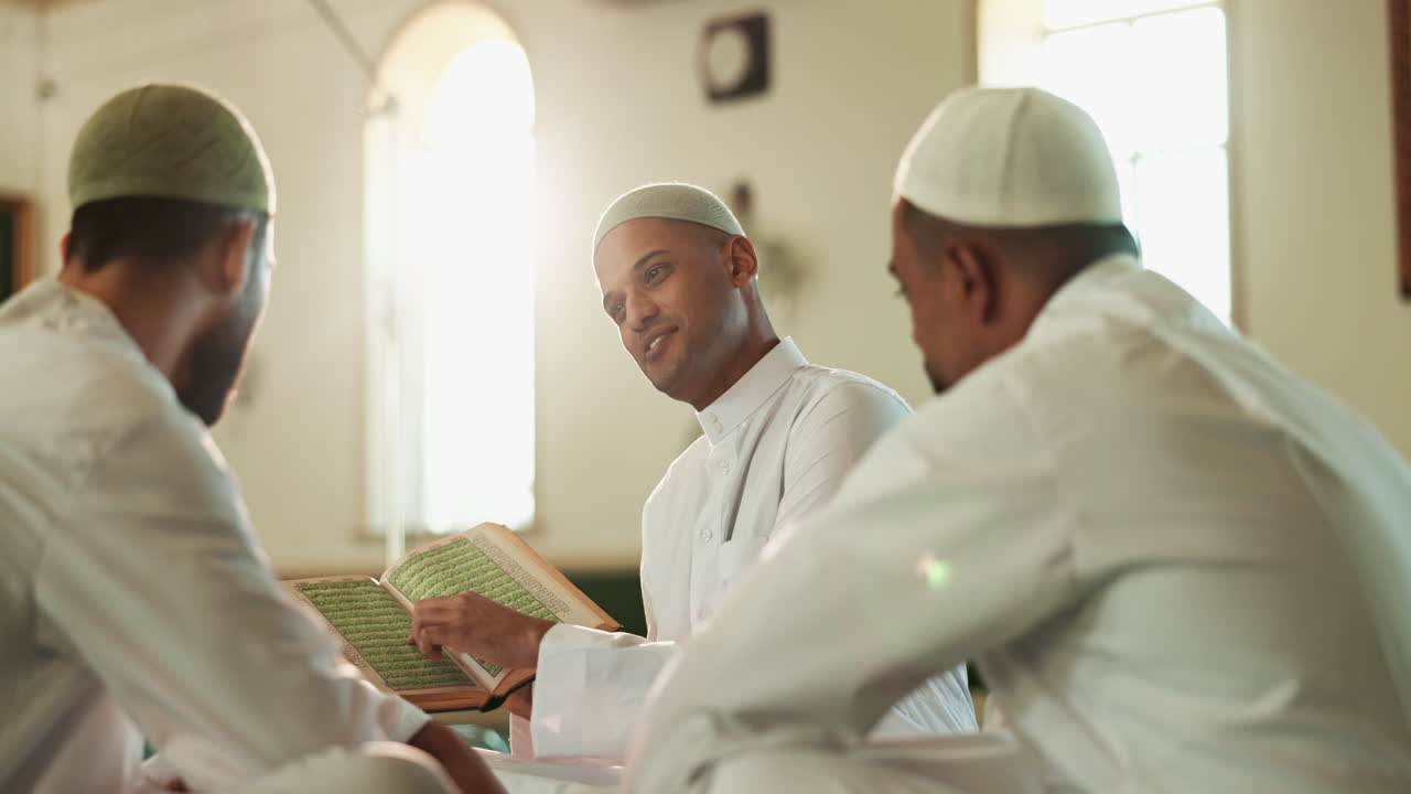 Muslim men reading the Koran