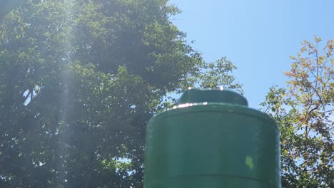 Splash-pad-water-park-sprayer-on-hot-summer-day