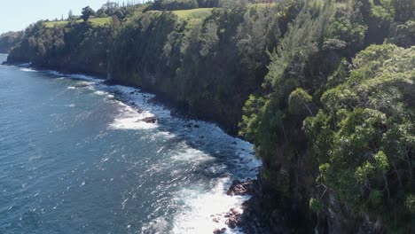 Panning-Drone-shot-with-the-beautiful-ocean-waves-crashing-on-the-shore