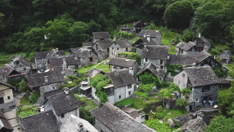 stone village of foroglio in mountains of switzerland, aerial drone view