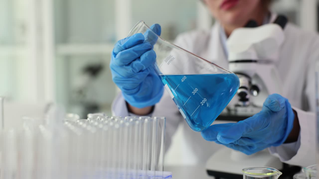 Scientist conducting experiment in lab