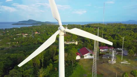 aerial drone shot: aerial 4k birds eye view on wind power / windmill