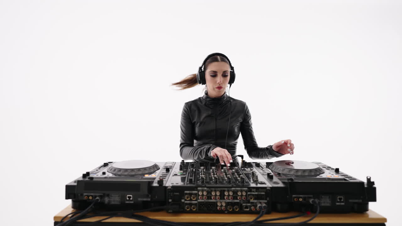 Woman DJ performing on a white background
