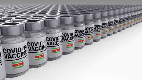 botellas de vacuna contra el covid-19 suriname