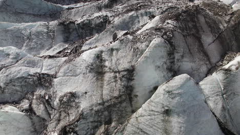 drone shot revealing pasterze glacier in the lower part of grossglockner mountain, austria