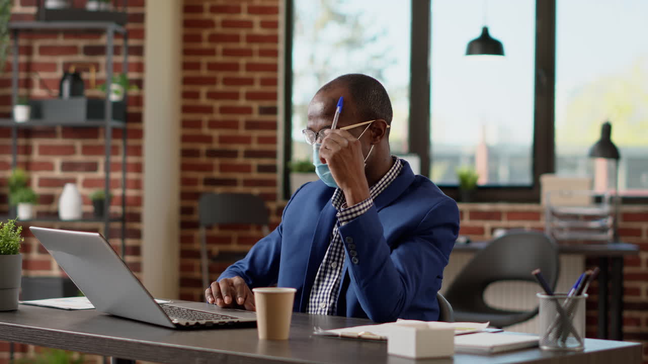 Pensive sales consultant thinking about financial strategy