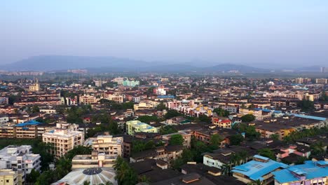 panoramic view of cityscape in vasai, mumbai india during sunset - aerial drone shot