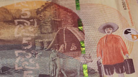Five Georgian lari banknotes close-up. Universal currency converter GEL Central Bank. 5 lari paper money macro. Economy, financial and banking concept .