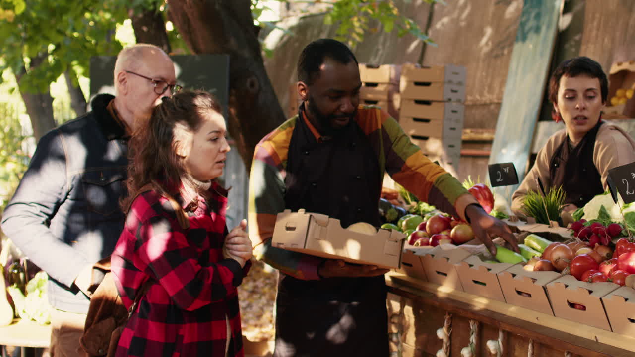 People shopping at a farmer's market