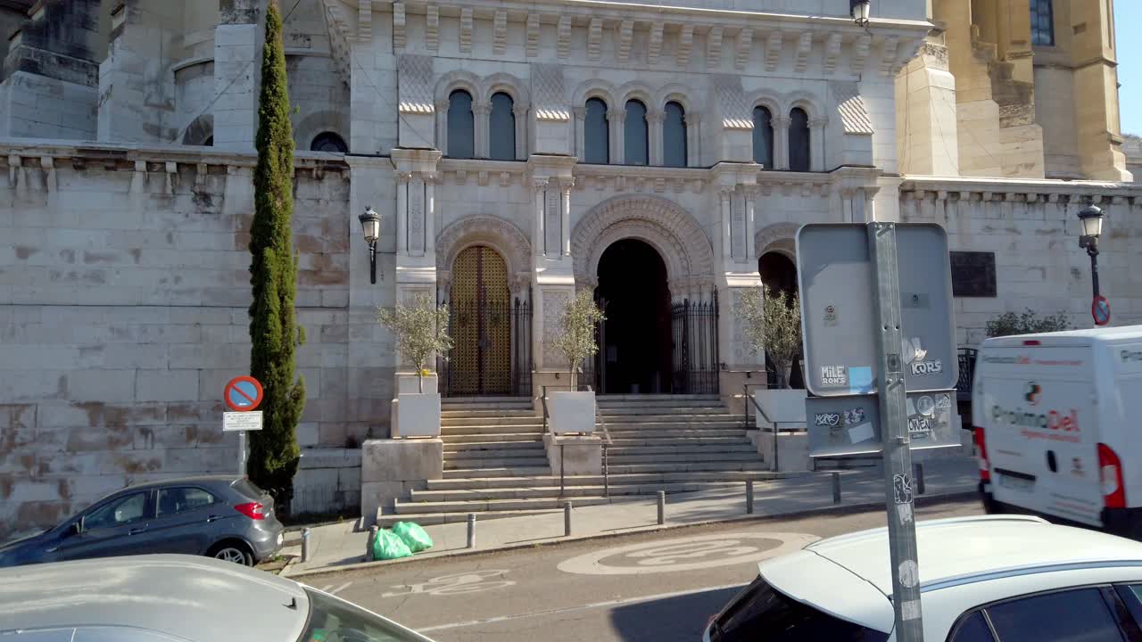 Exterior of a historical stone building in a city