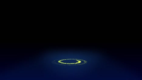 animation about glowing particles. the red, orange, and yellow particles form a rotating circle and gradually spread outward on the ground. the background is black.